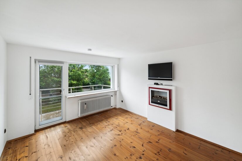 Schlafzimmer mit Balkonzugang